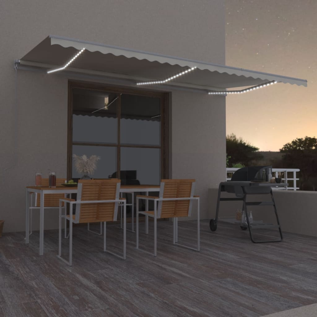 Manuell uttrekkbar markise med LED 600x350 cm kremhvit vidaXL