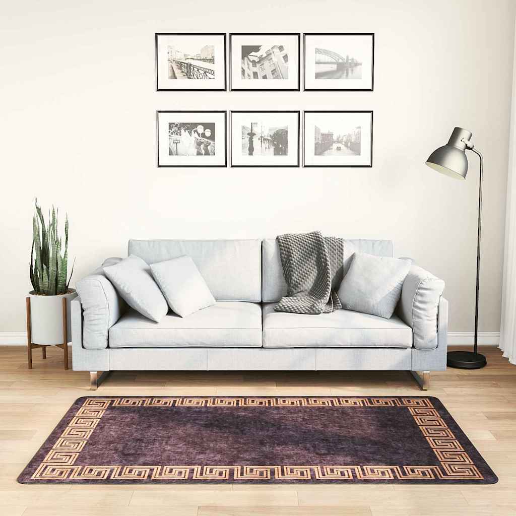 Vaskbart teppe 80x150 cm svart og gull