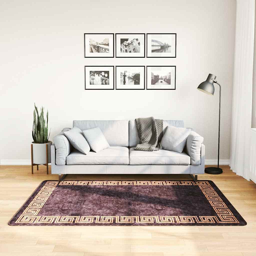 Vaskbart teppe 120x180 cm svart og gull