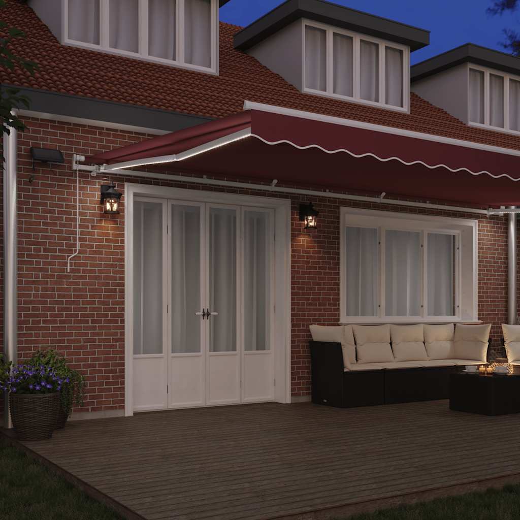 Manuell uttrekkbar markise med LED burgunder 600x300 cm