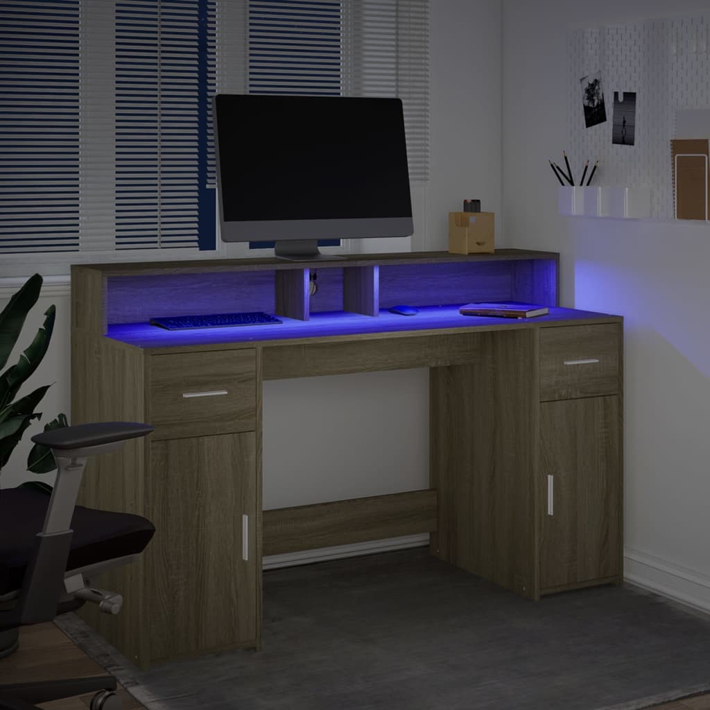 Skrivebord med LED-lys sonoma eik 140x55x91 cm konstruert tre