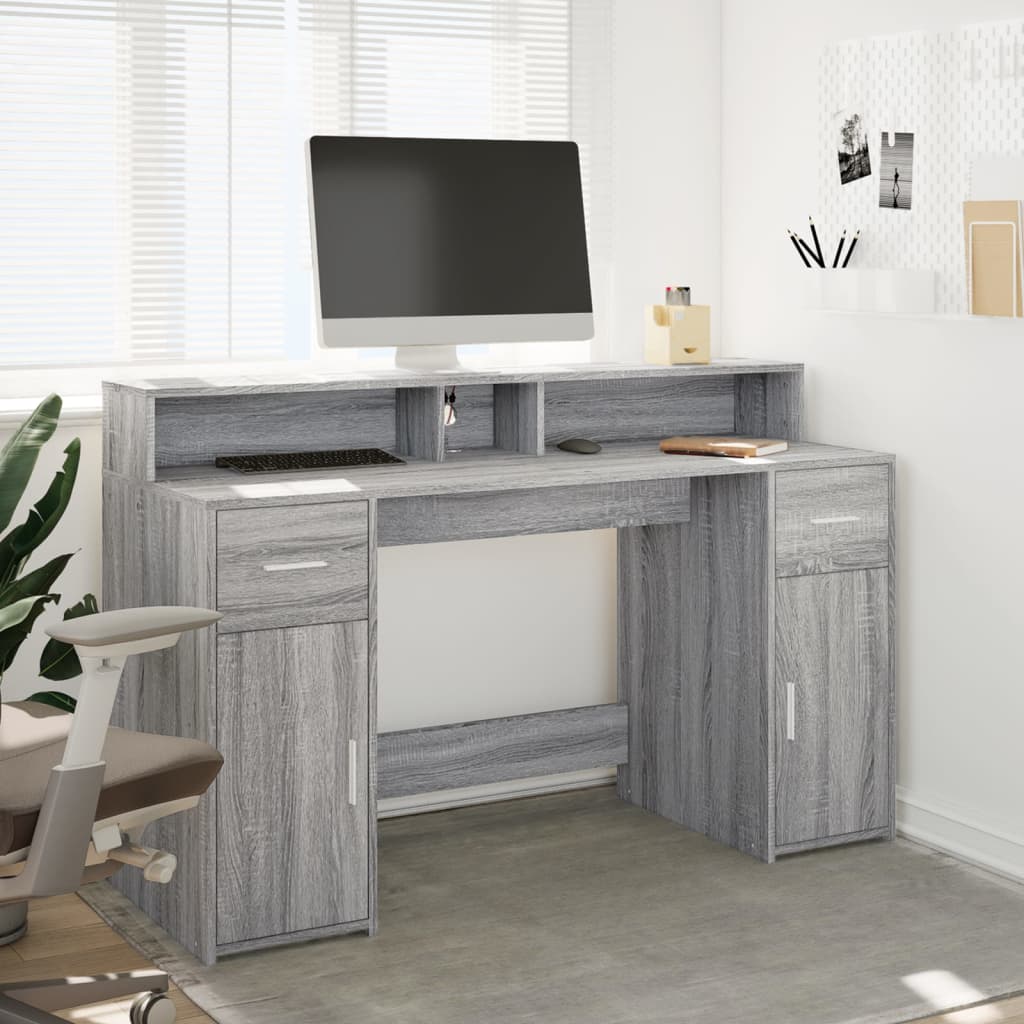 Skrivebord med LED-lys grå sonoma 140x55x91 cm konstruert tre