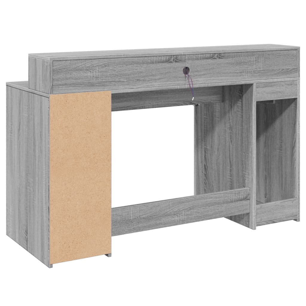 Skrivebord med LED-lys grå sonoma 140x55x91 cm konstruert tre