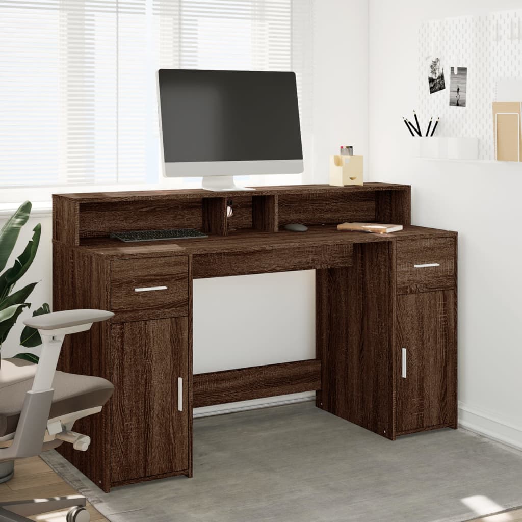 Skrivebord med LED-lys brun eik 140x55x91 cm konstruert tre