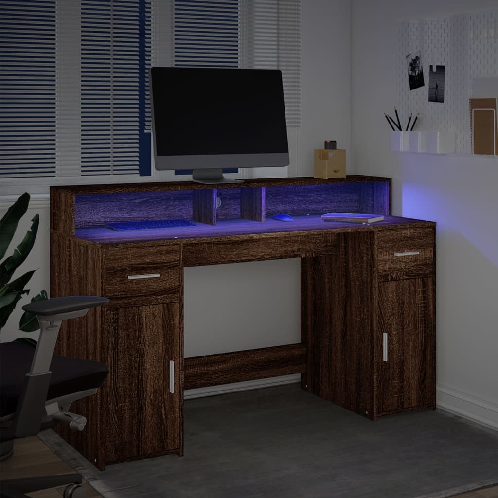 Skrivebord med LED-lys brun eik 140x55x91 cm konstruert tre