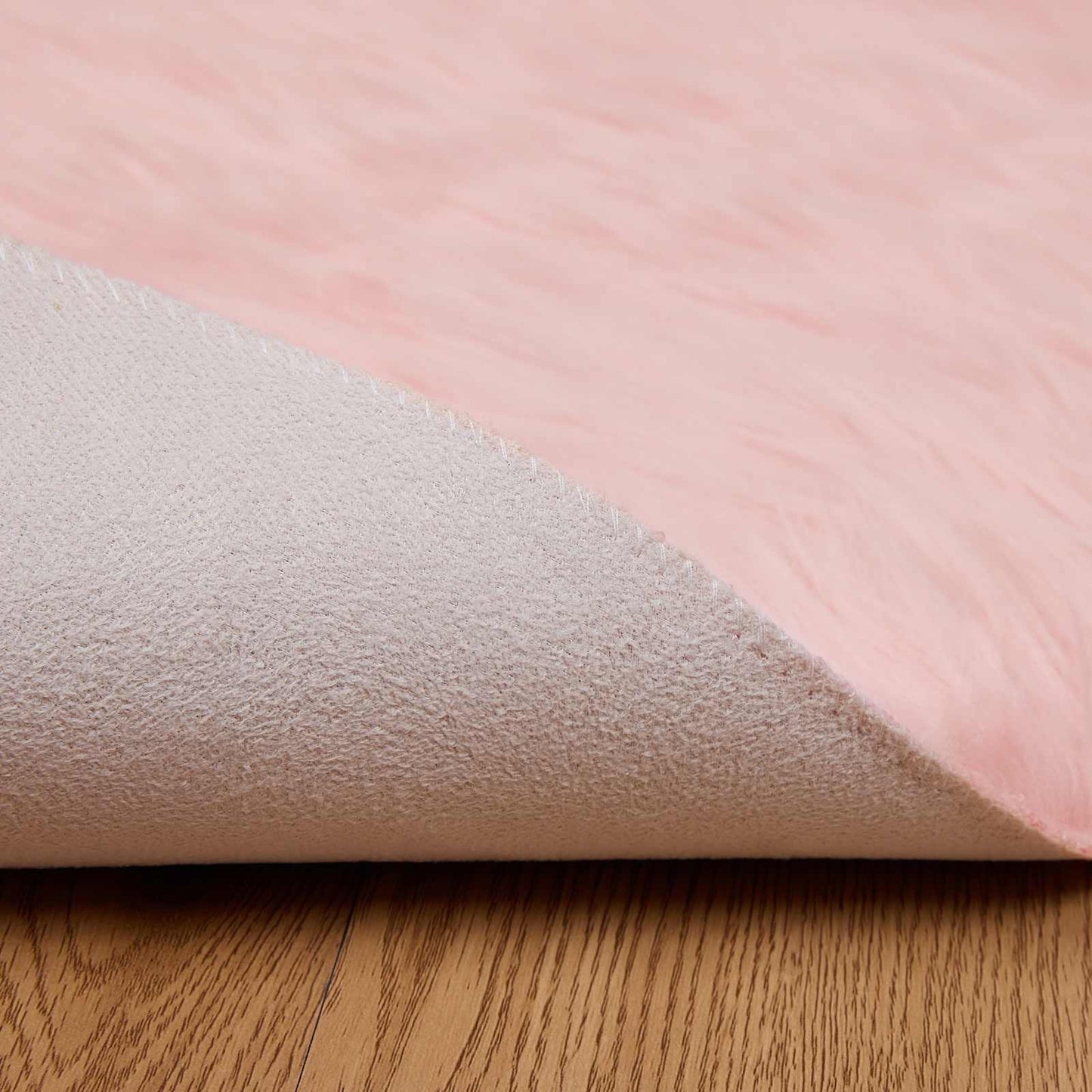 Fusk saueskinnteppe TAFALLA Rosa Ø 80 cm Polyester