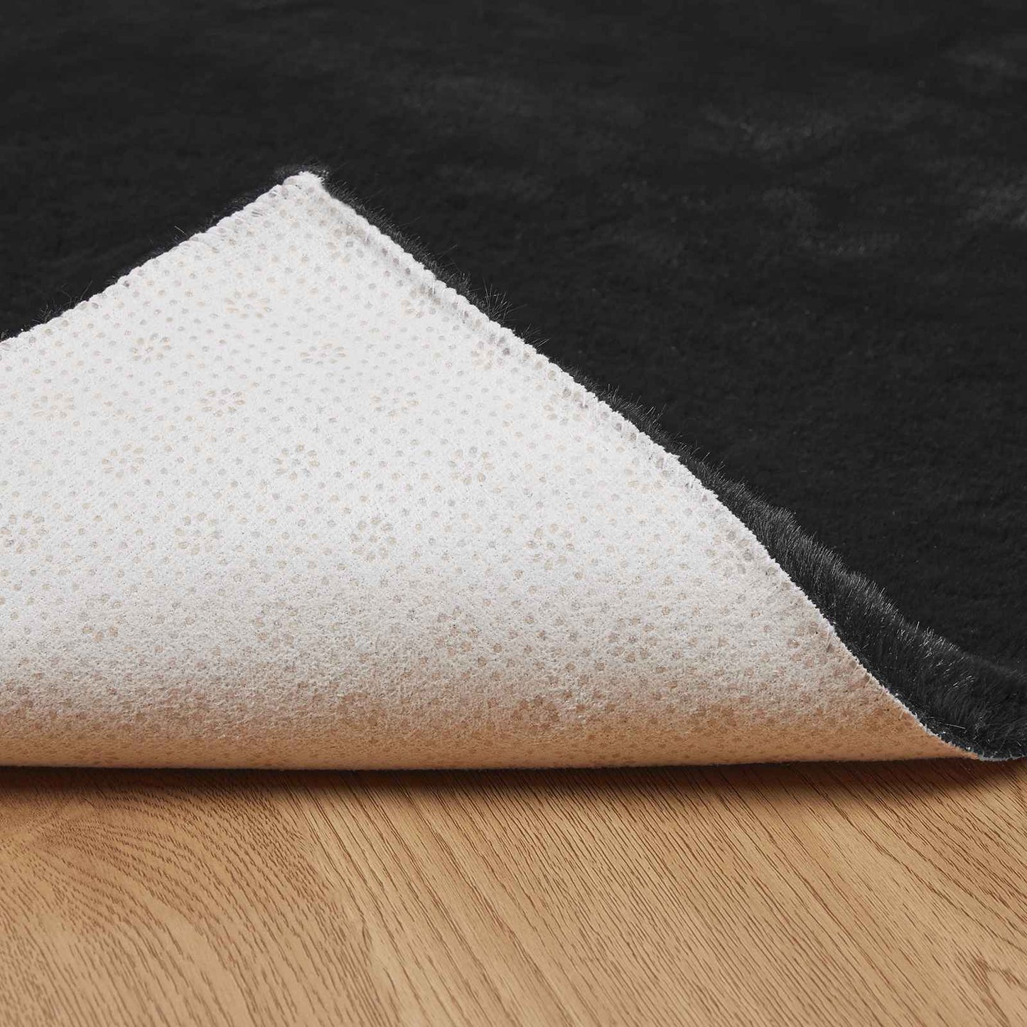 Skliikkerteppe i kunstig kaninpels OLITE Svart 80 x 150 cm