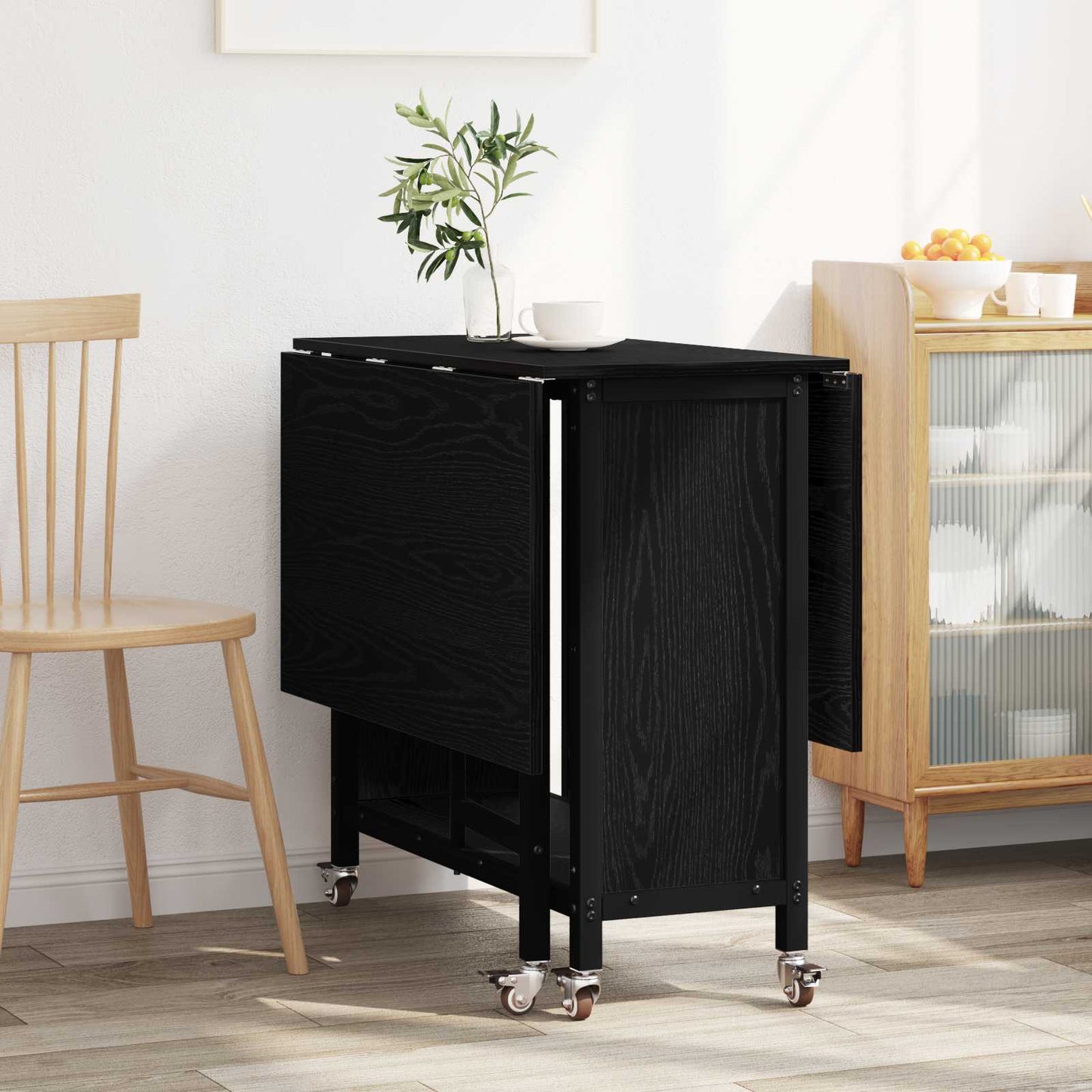 Sammenleggbart spisebord med hjul 130 x 80 x 76,5 cm Svart eik