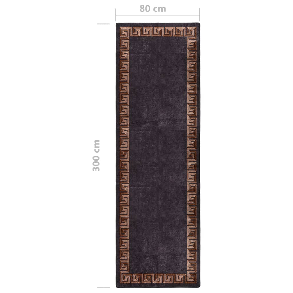 Vaskbart teppe 80x300 cm svart og gull