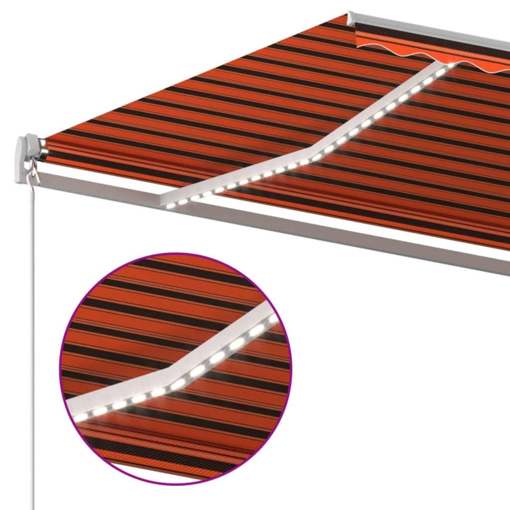 Manuell uttrekkbar markise med LED 600x300 cm oransje og brun vidaXL