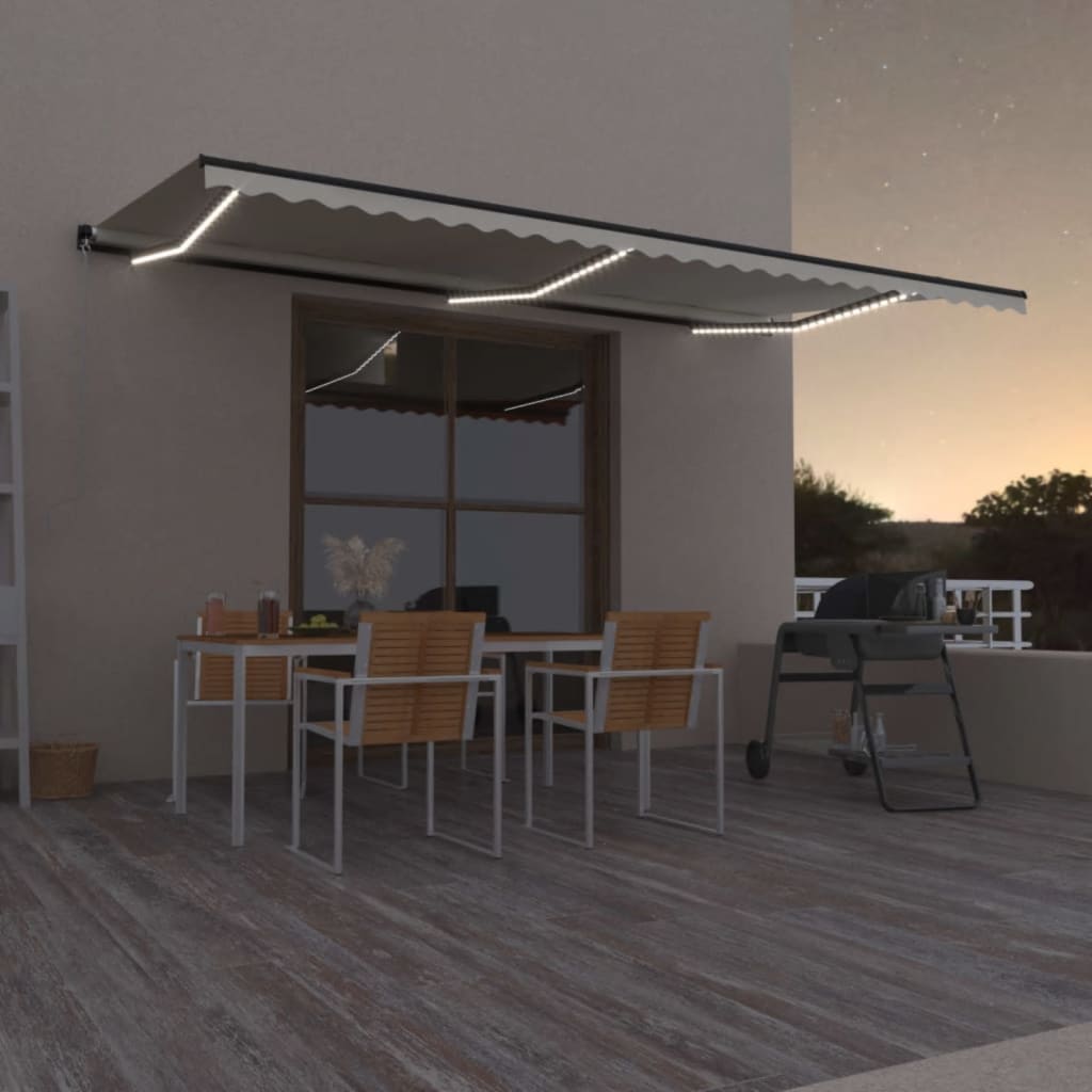 Manuell uttrekkbar markise med LED 600x350 cm kremhvit vidaXL