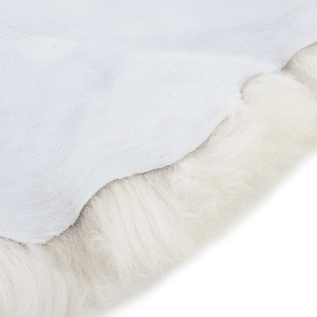 Teppe av saueskinn (60-70)x(90-100) cm kremhvit