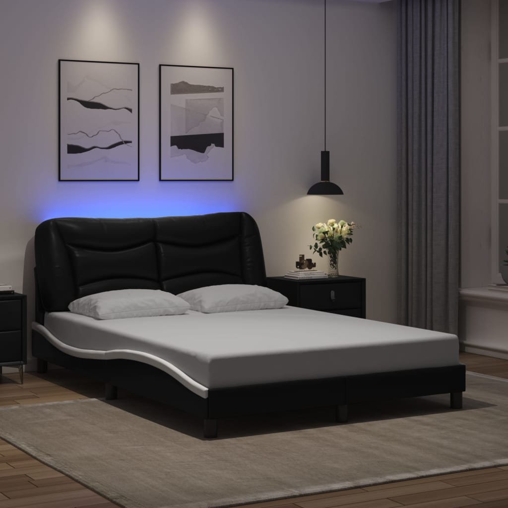 Sengeramme med LED-lys svart og hvit 140x190 cm kunstig lær