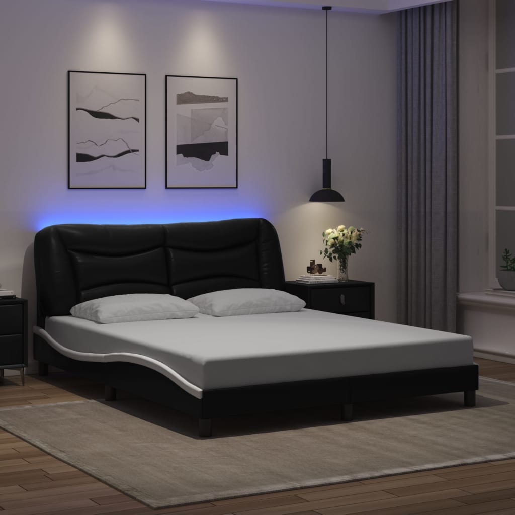 Sengeramme med LED-lys svart og hvit 160x200 cm kunstig lær