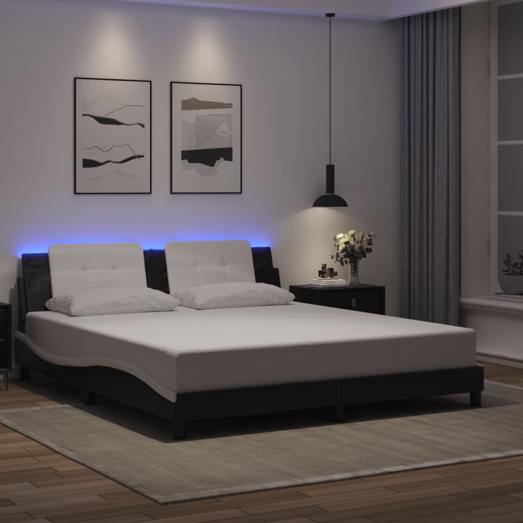 Sengeramme med LED-lys svart og hvit 180x200 cm kunstig lær
