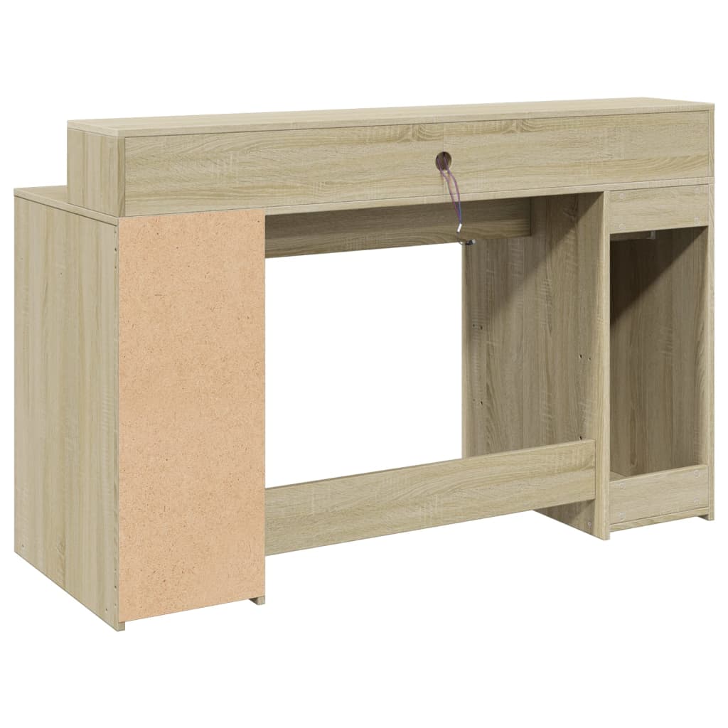 Skrivebord med LED-lys sonoma eik 140x55x91 cm konstruert tre