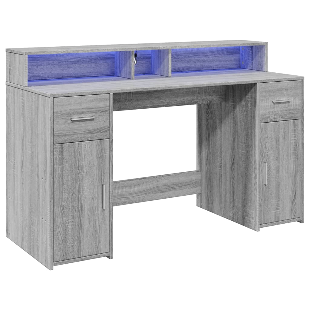 Skrivebord med LED-lys grå sonoma 140x55x91 cm konstruert tre