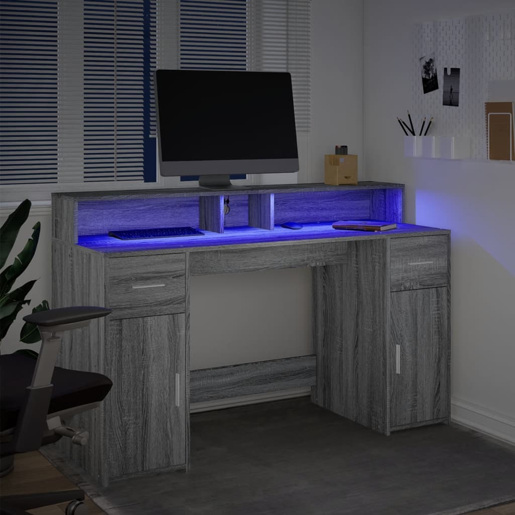 Skrivebord med LED-lys grå sonoma 140x55x91 cm konstruert tre
