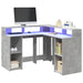 Skrivebord med LED-lys betonggrå 130x130x91 cm konstruert tre