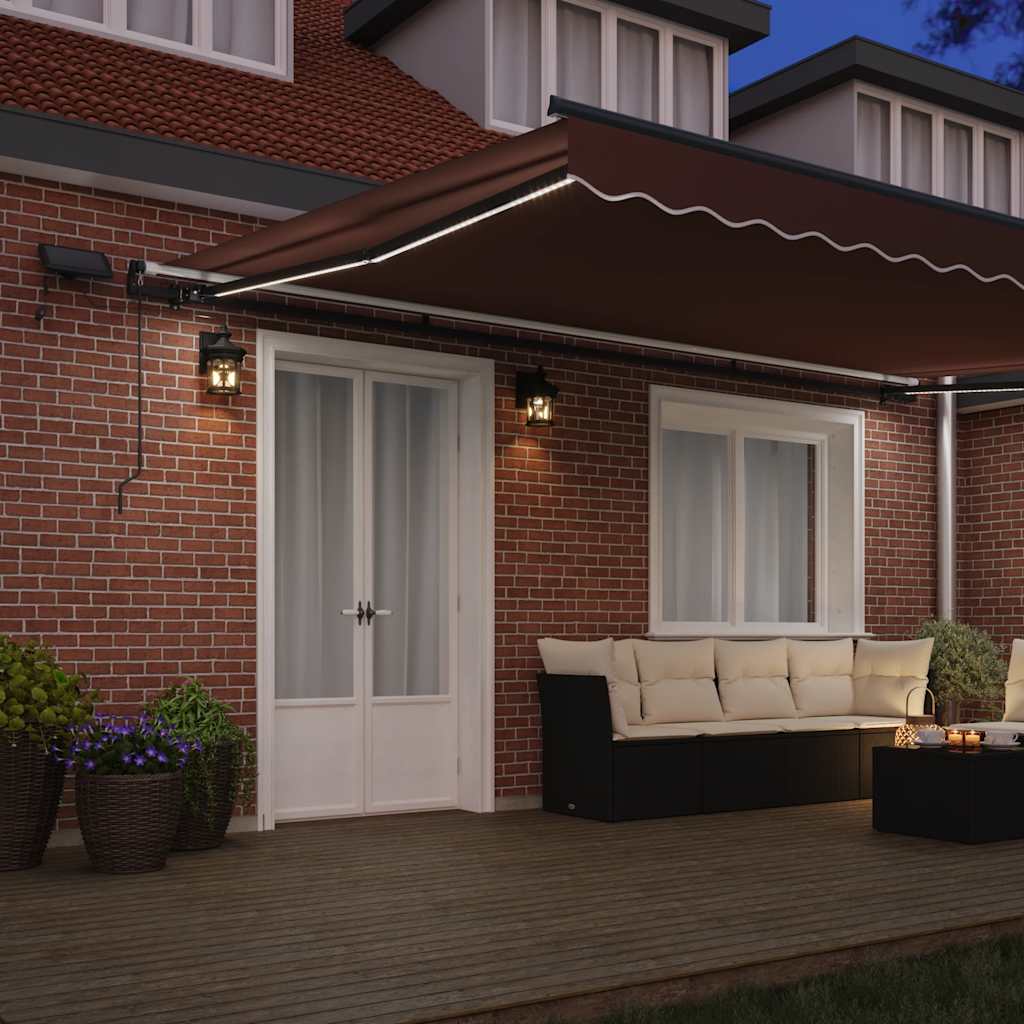 Manuell uttrekkbar markise med LED brun 500x300 cm
