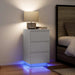 Nattbord med LED-lys hvit 38x34x65 cm