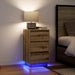 Nattbord med LED-lys artisan eik 38x34x65 cm