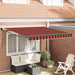 Uttrekkbar markise Oransje 300 x 250 cm Polyester og Metall