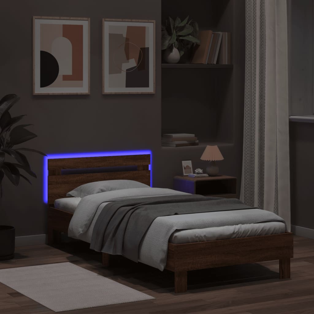 Sengeramme med hodegavl og LED-lys brun eik 100x200 cm