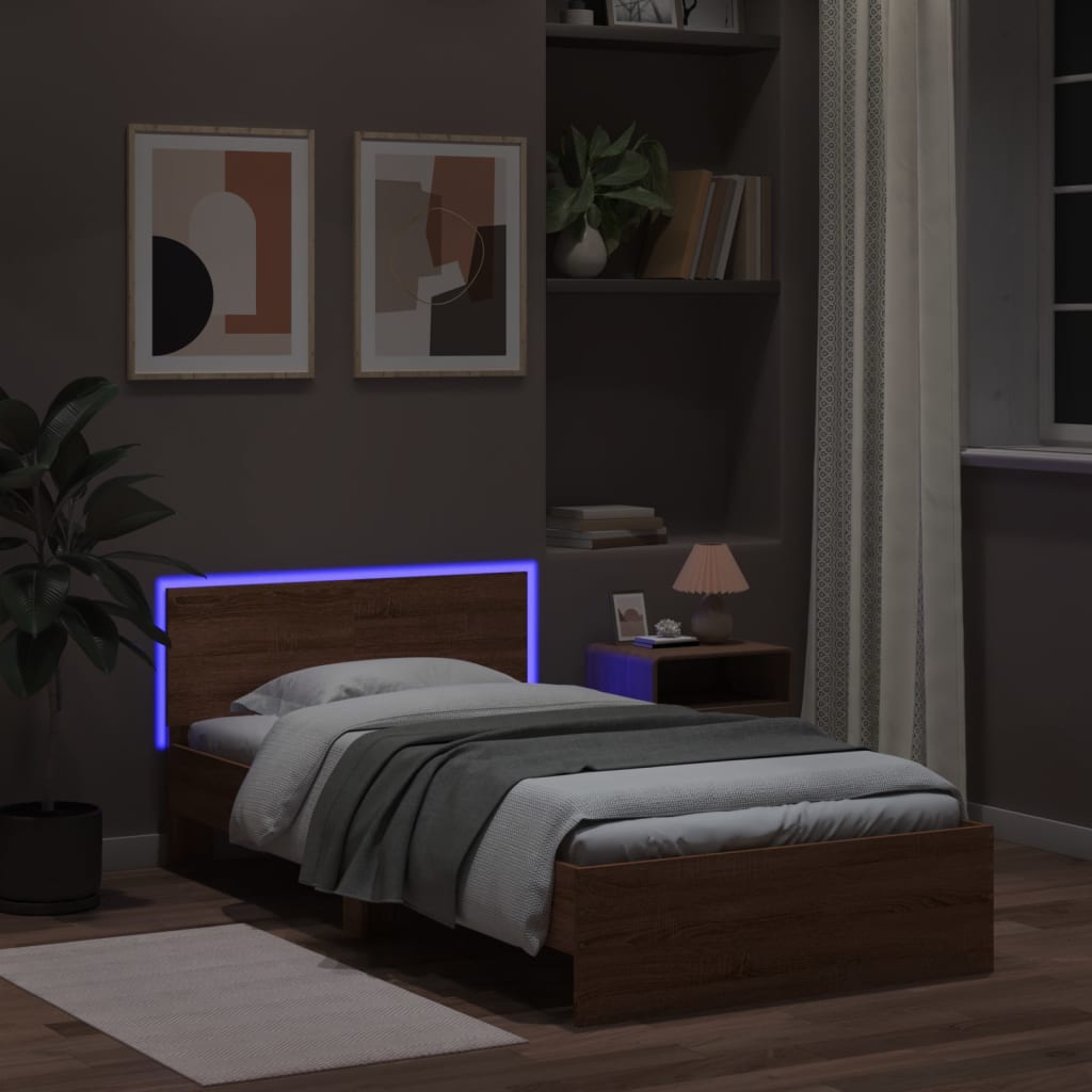 Sengeramme med hodegavl og LED-lys brun eik 100x200 cm